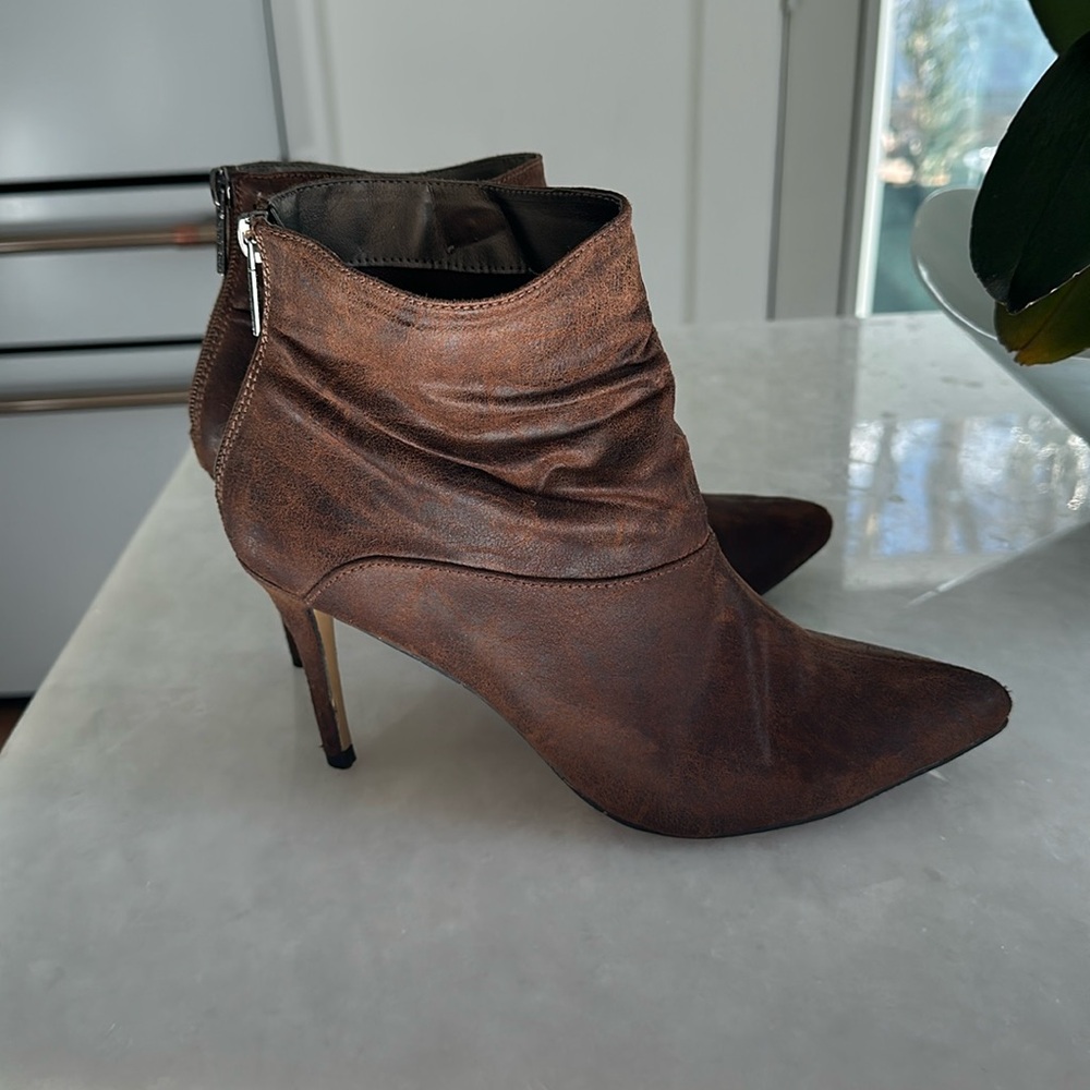 Brown leather ankle bootie with heel